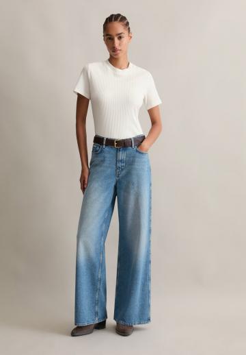 Клешеные джинсы