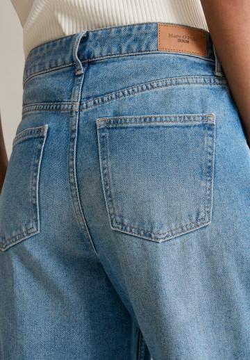 Клешеные джинсы