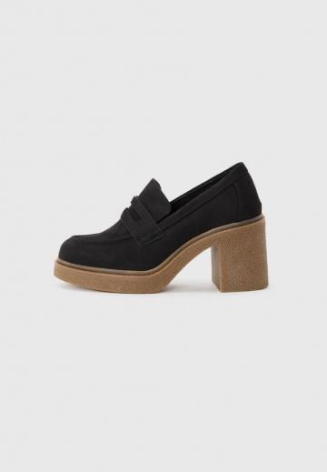 Туфли на высоком каблуке