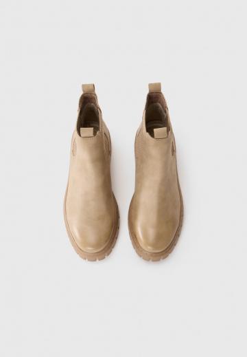 Сапожки на танкетке