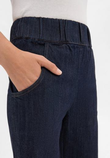 Клешеные джинсы