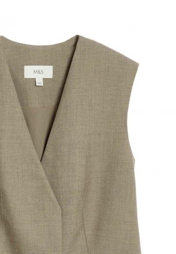 Длинный жилет