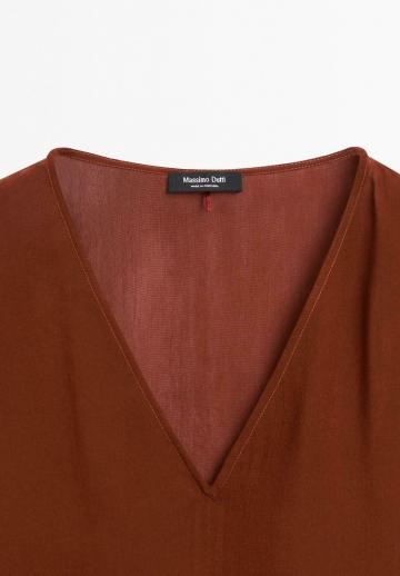 Длинная блузка