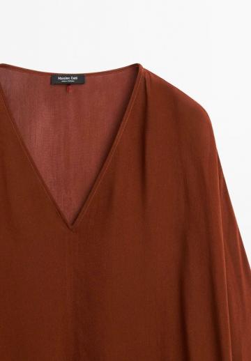 Длинная блузка