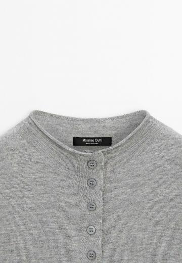 Вязаный жилет