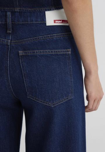 Клешеные джинсы