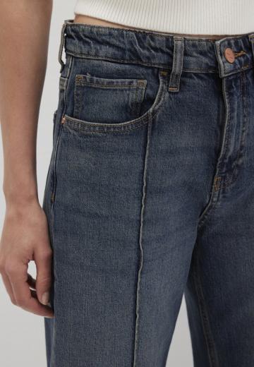 Клешеные джинсы