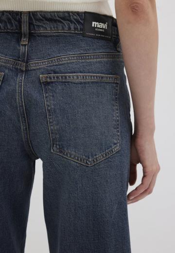 Клешеные джинсы