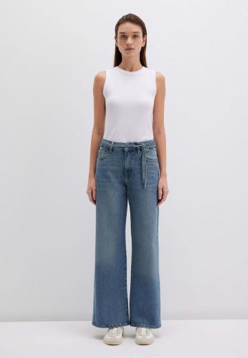 Клешеные джинсы