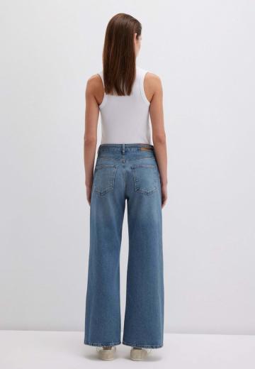 Клешеные джинсы