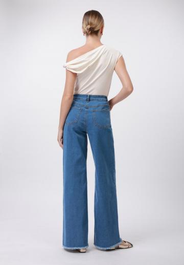 Клешеные джинсы