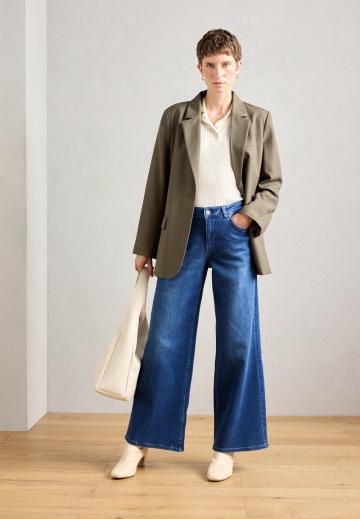 Клешеные джинсы