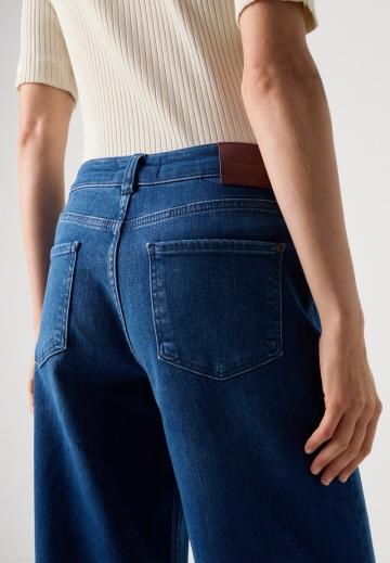 Клешеные джинсы