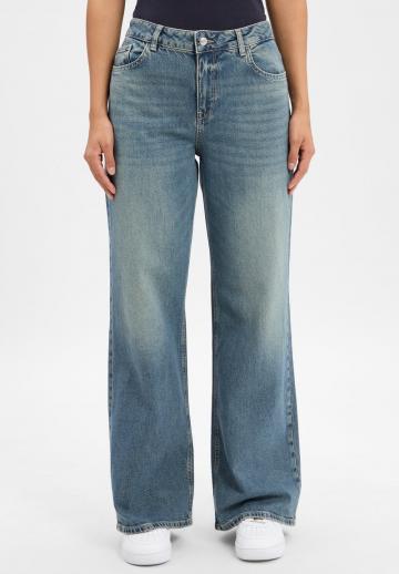 Клешеные джинсы