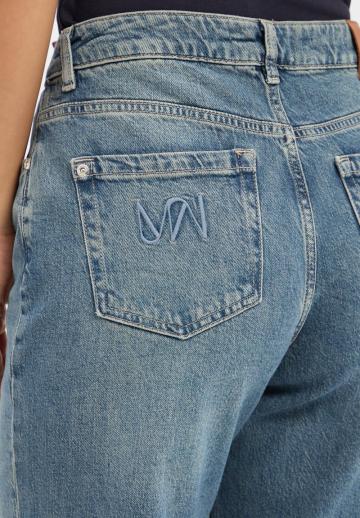 Клешеные джинсы