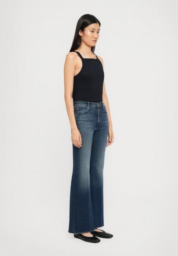 Клешеные джинсы