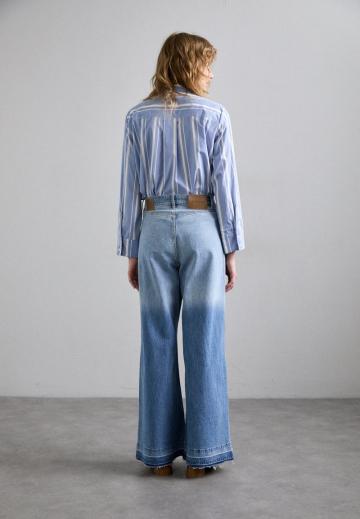 Клешеные джинсы