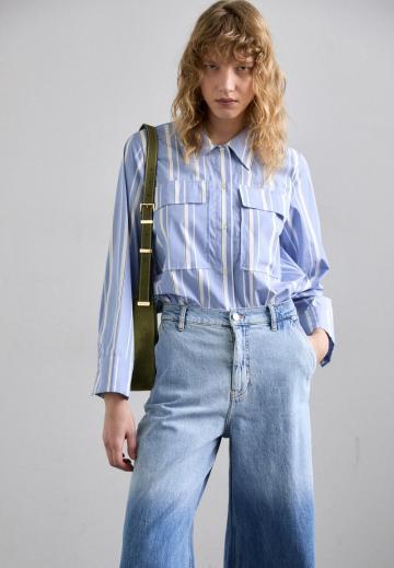 Клешеные джинсы