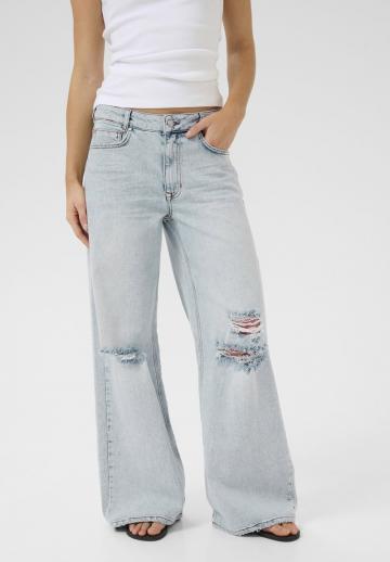 Клешеные джинсы