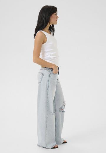 Клешеные джинсы