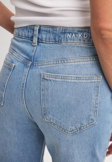 Клешеные джинсы