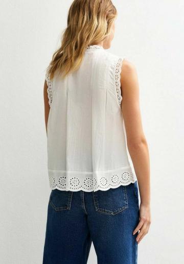 Блузка без рукавов