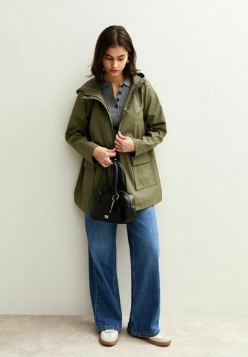 Пальто из искусственной кожи