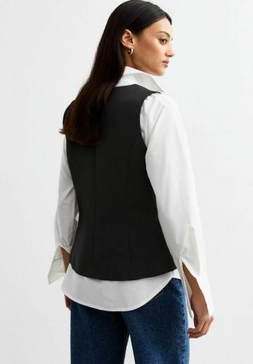 Джинсовая жилетка