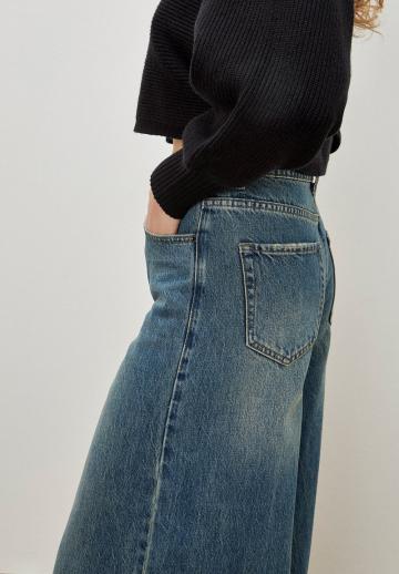 Клешеные джинсы