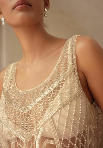 Блузка без рукавов