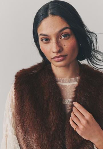 Пуховой жилет