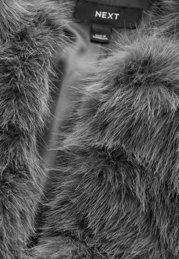 Пуховой жилет