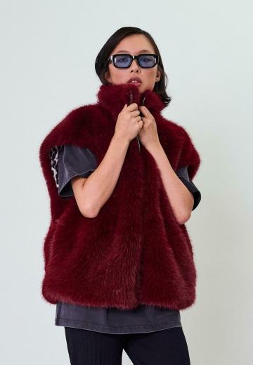 Пуховой жилет