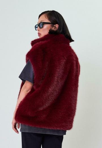 Пуховой жилет