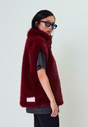 Пуховой жилет