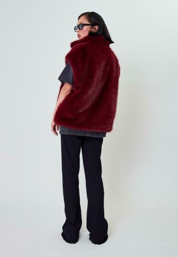 Пуховой жилет