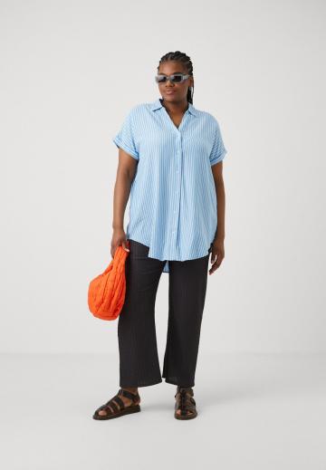 Длинная блузка