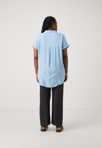 Длинная блузка