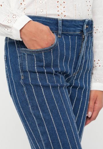 Клешеные джинсы