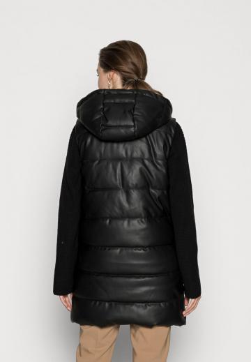 Длинный жилет