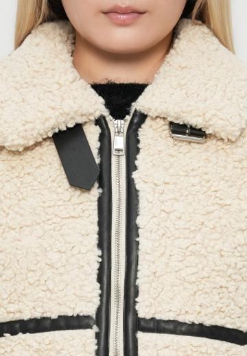 Длинный жилет