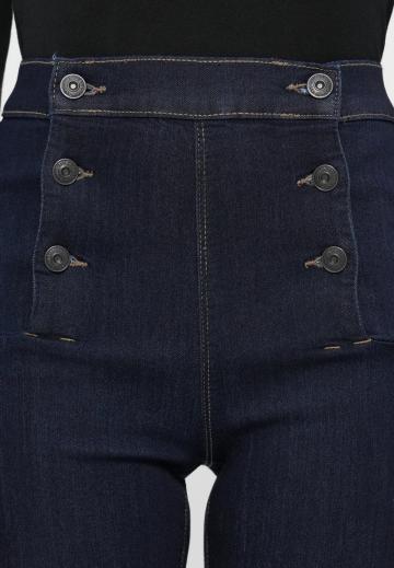 Клешеные джинсы