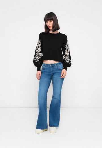 Клешеные джинсы