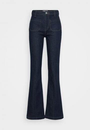 Клешеные джинсы