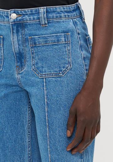 Клешеные джинсы