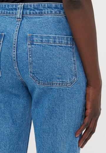 Клешеные джинсы