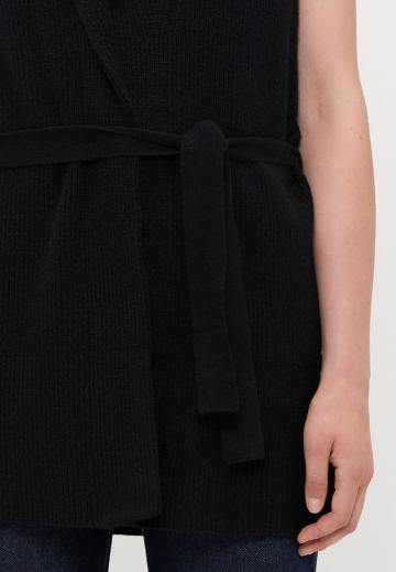 Длинный жилет