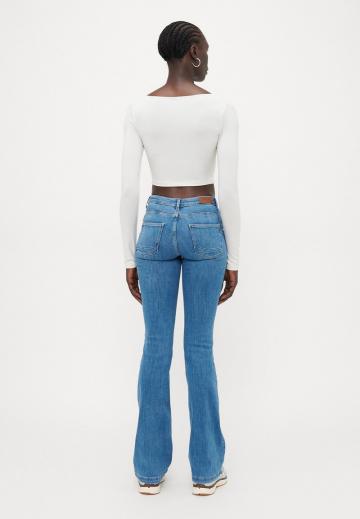 Клешеные джинсы