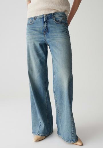Клешеные джинсы