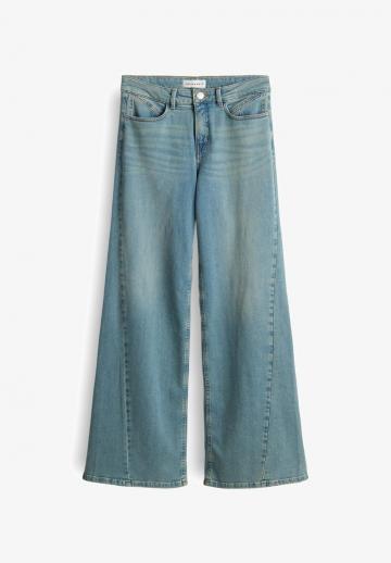 Клешеные джинсы